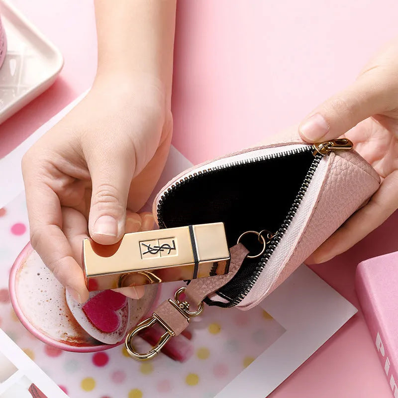 Minimalist black waterproof PU leather zip key pouch for car keys on table