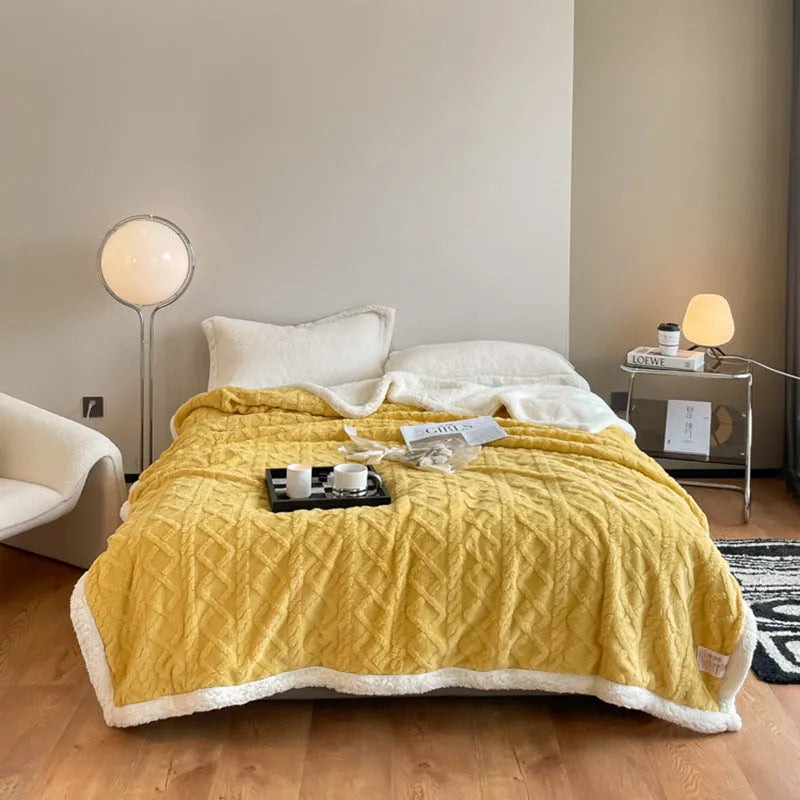 Polyester thermal flannel blanket in beige colour, shown folded to display its thick texture and modern style