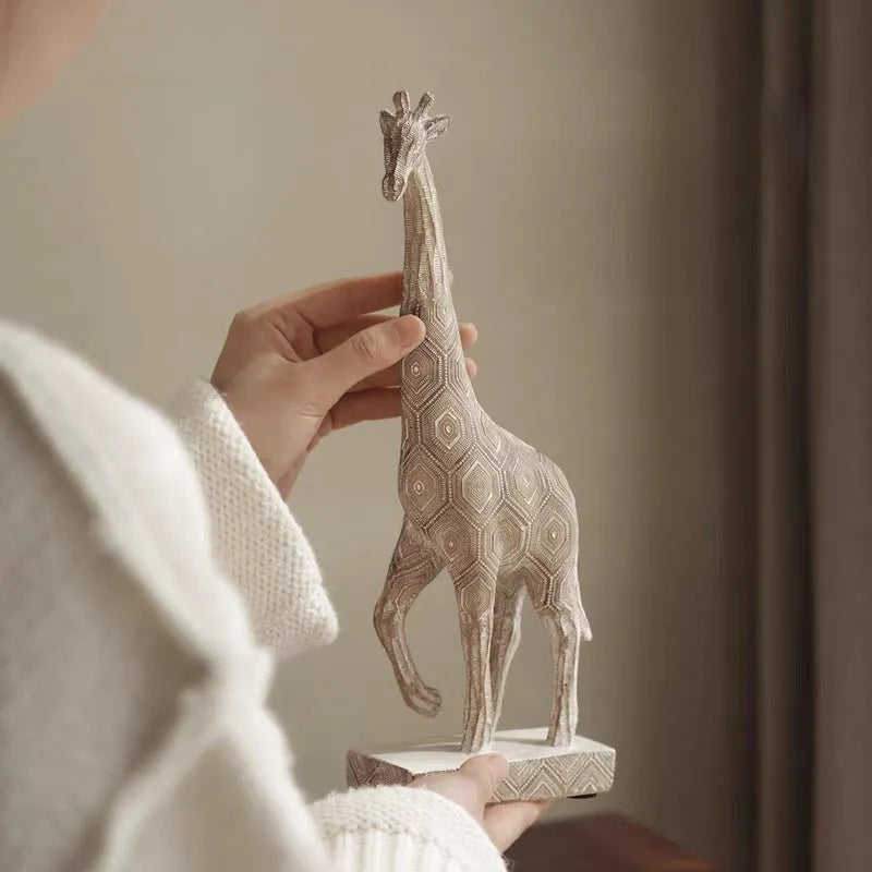 Wood colour giraffe ornament made from synthetic resin measuring 30.5cm tall