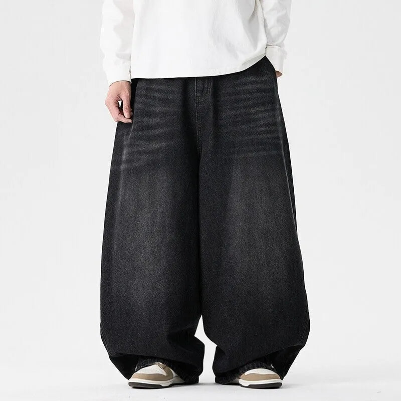 Men's plus size wide leg casual jeans in dark blue denim with straight leg opening