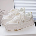 Children's board shoes with thick rubber soles and cross shoulder straps on synthetic leather upper