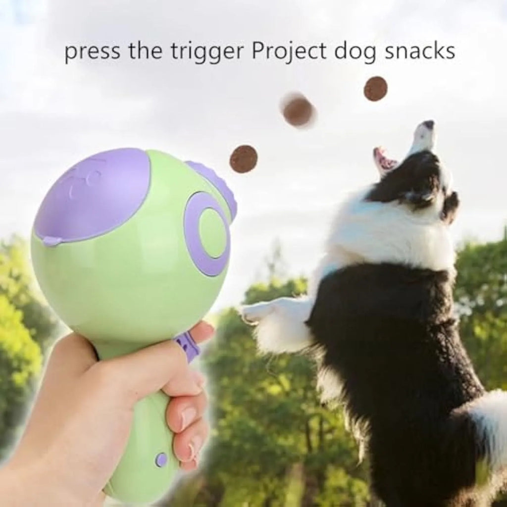 Green orange pink dog treat launcher toy measuring 15.5cm x 9cm x 8.5cm