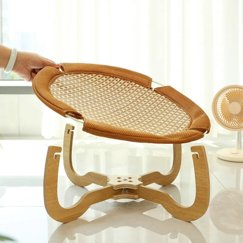 Brown woven rattan pet hammock bed measuring 46cm square with raised platform design
