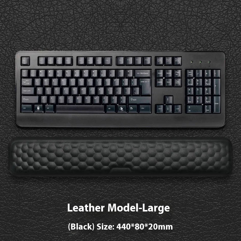 Grey and black memory foam mouse wrist pads with silicone bases, shown in cloth and leather cover options.
