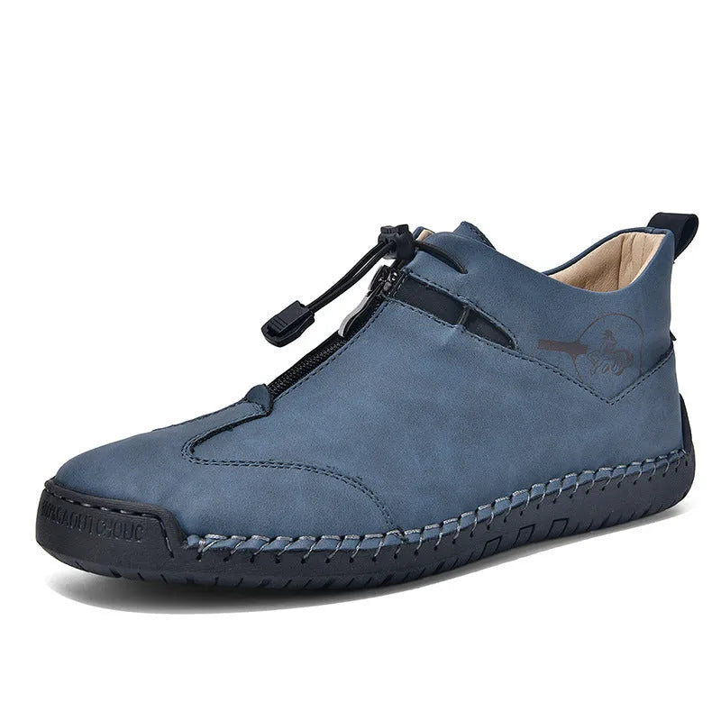 Men's black casual leather shoes with round toe and mid heel on a rubber sole