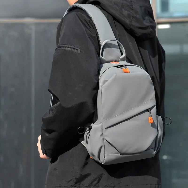 Men's black casual crossbody bag made from waterproof polyester material