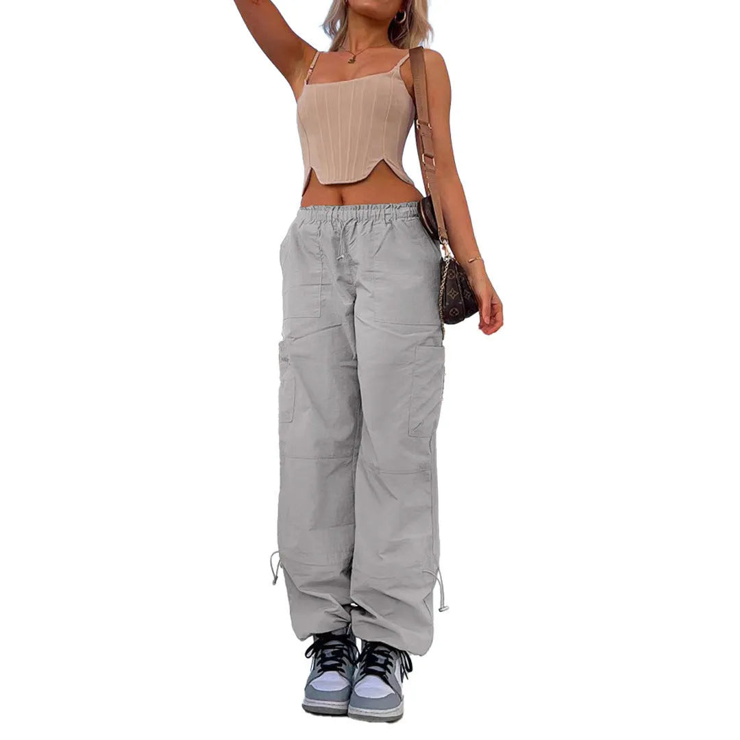 Multi-pocket cargo casual pants in a loose fit, shown in a neutral colour like grey or khaki.