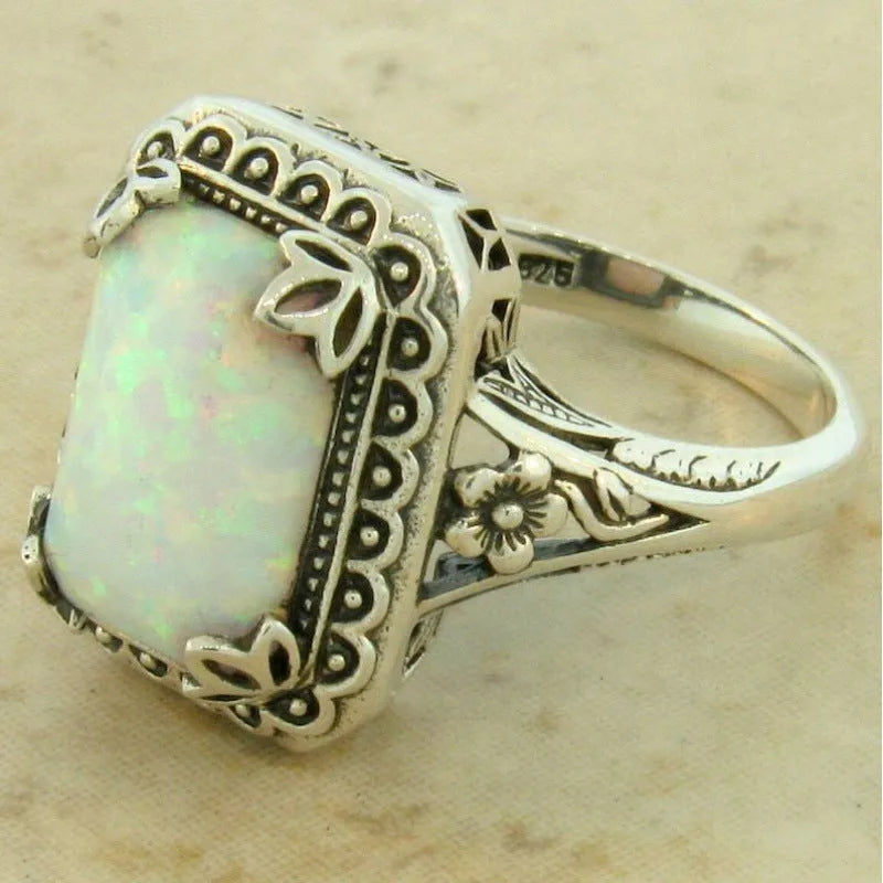 Silver geometric alloy ring with inlaid opal stone, available in multiple sizes