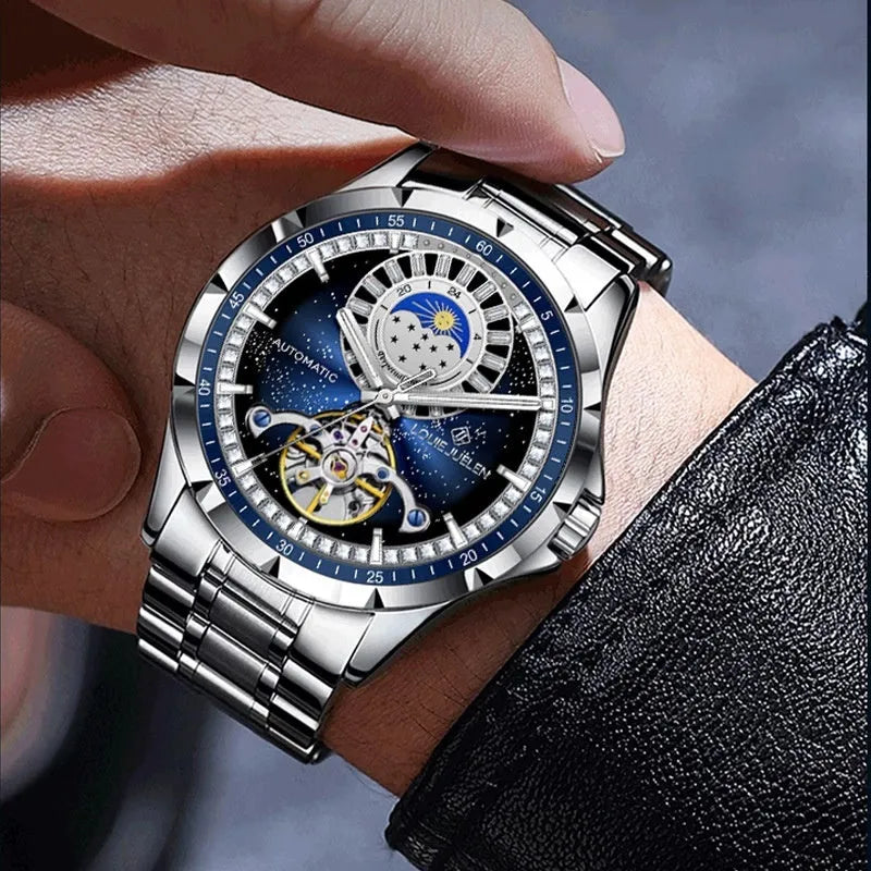 Men's silver alloy automatic watch with blue dial on a stainless steel strap featuring a butterfly clasp