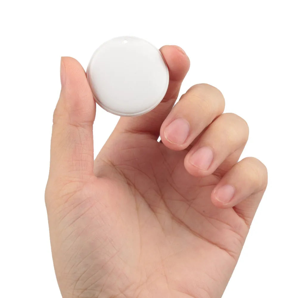 White GPS tracker device with hanging rope for attaching to keys or pet collars