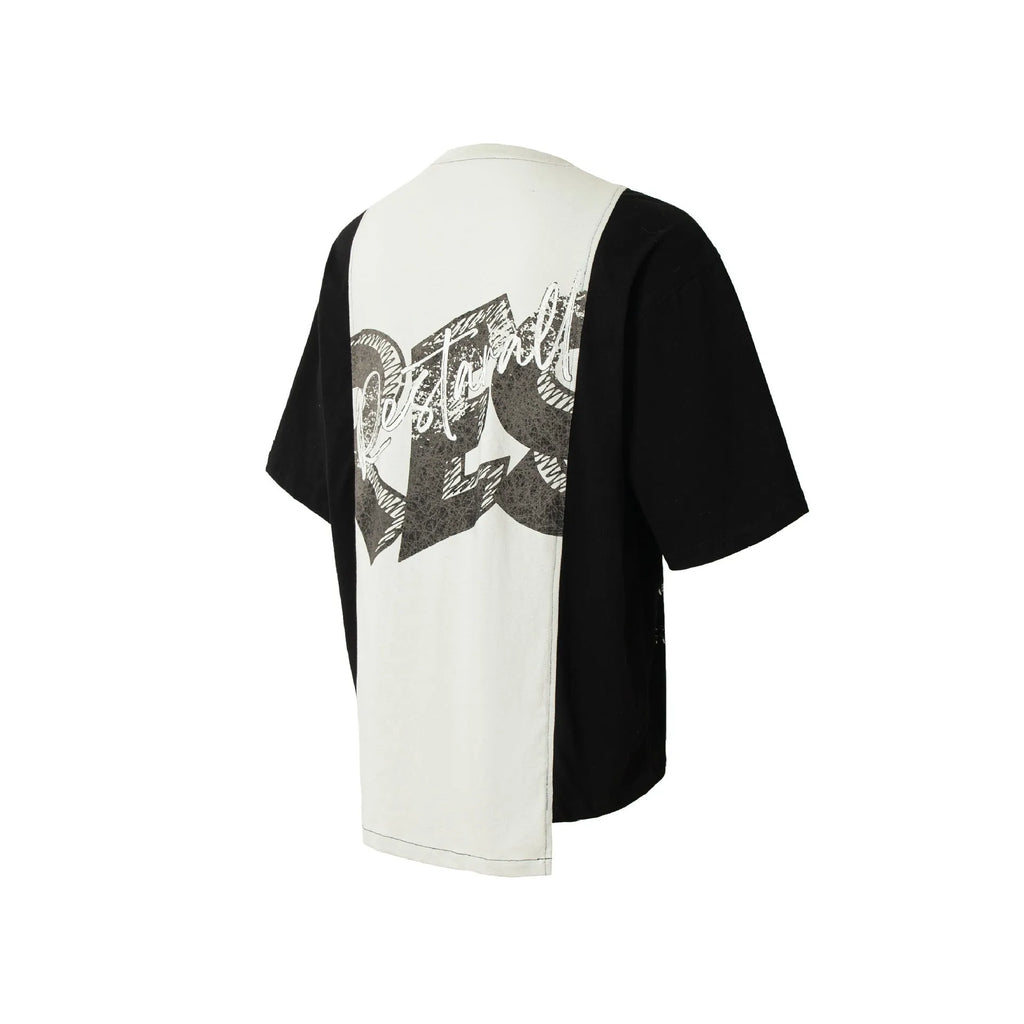 Black and white broken collage deconstruction print on a loose fit cotton blend t-shirt