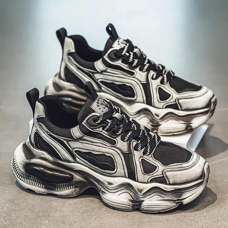 Men's black mesh sneakers with white rubber sole and platform heel on a plain background