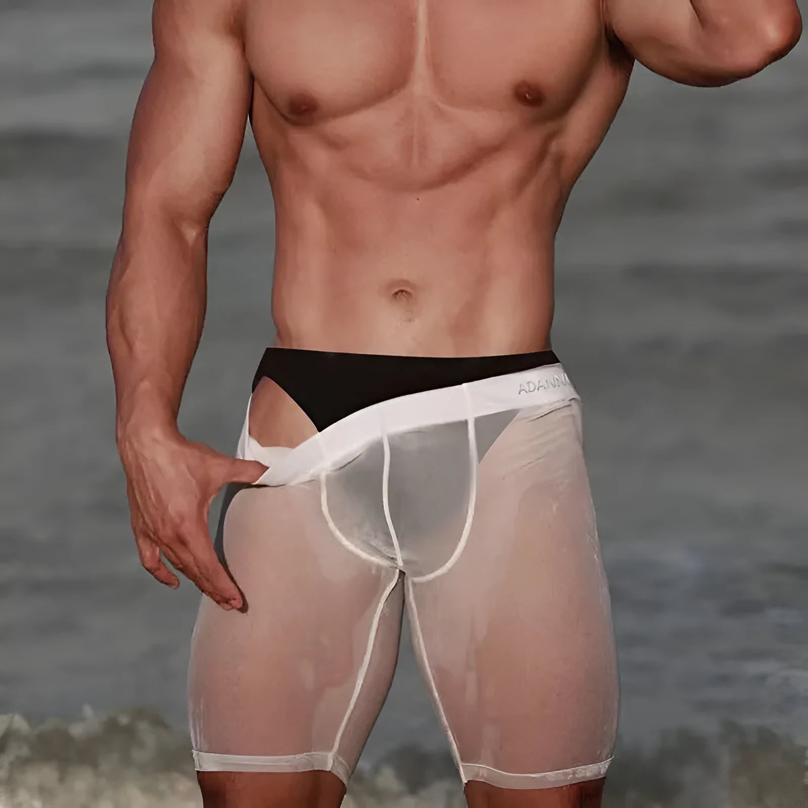 Men's solid colour seamless mesh shorts in knitted nylon fabric.