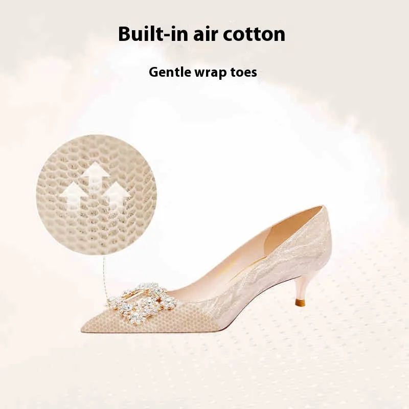 Champagne gold pointed toe stiletto high heel pumps with slip-on closure on a plain background.
