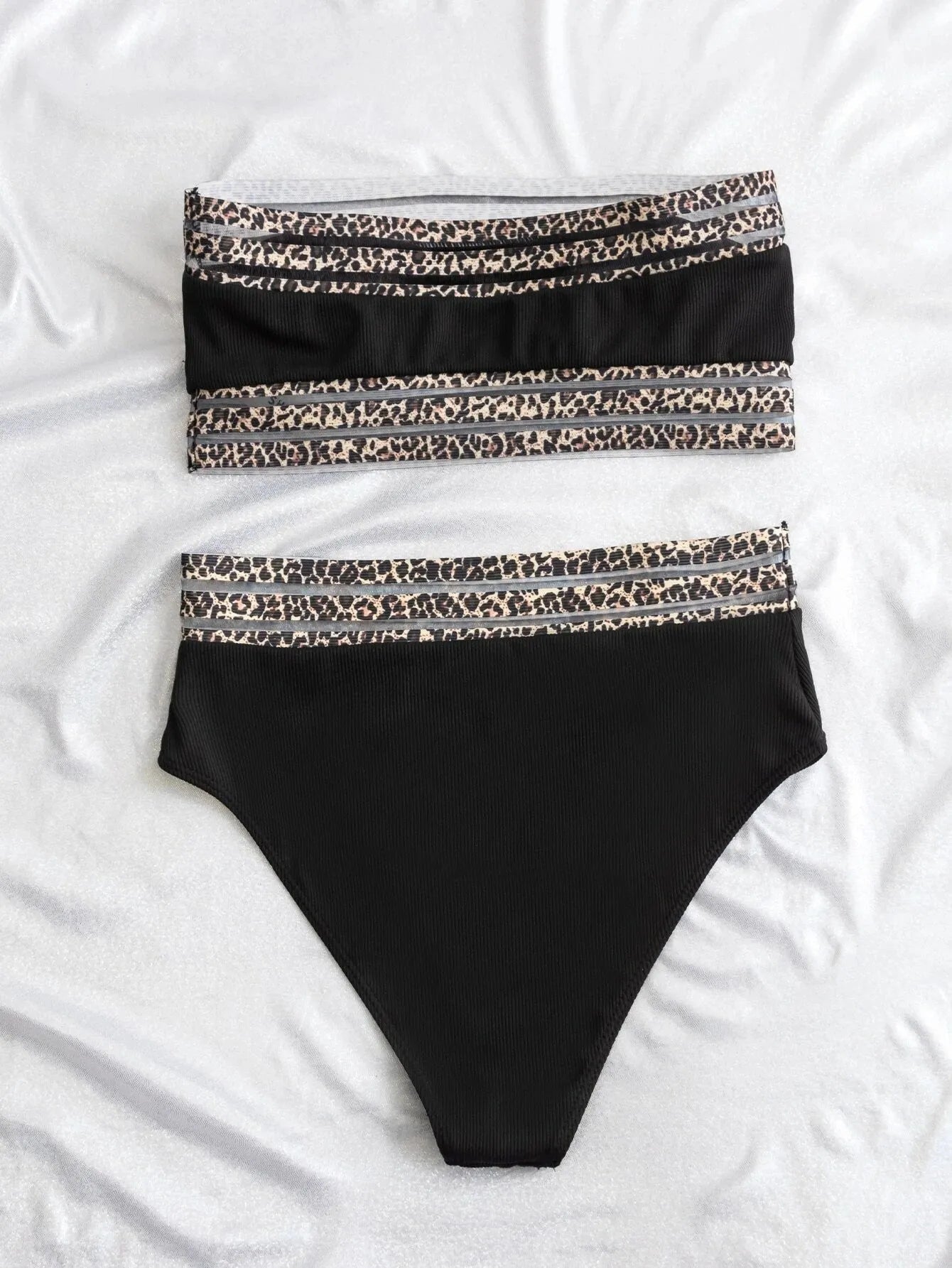 Black strapless split swimsuit with leopard print splicing detail.