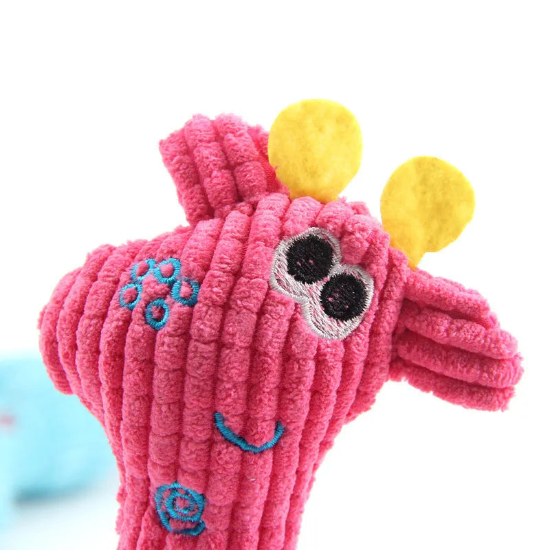 Deer-shaped plush pet toy with corn grain texture in blue, pink and yellow colour options