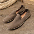 Handmade men's low-top shoes in khaki cowhide with a flat wedge heel and rubber sole.