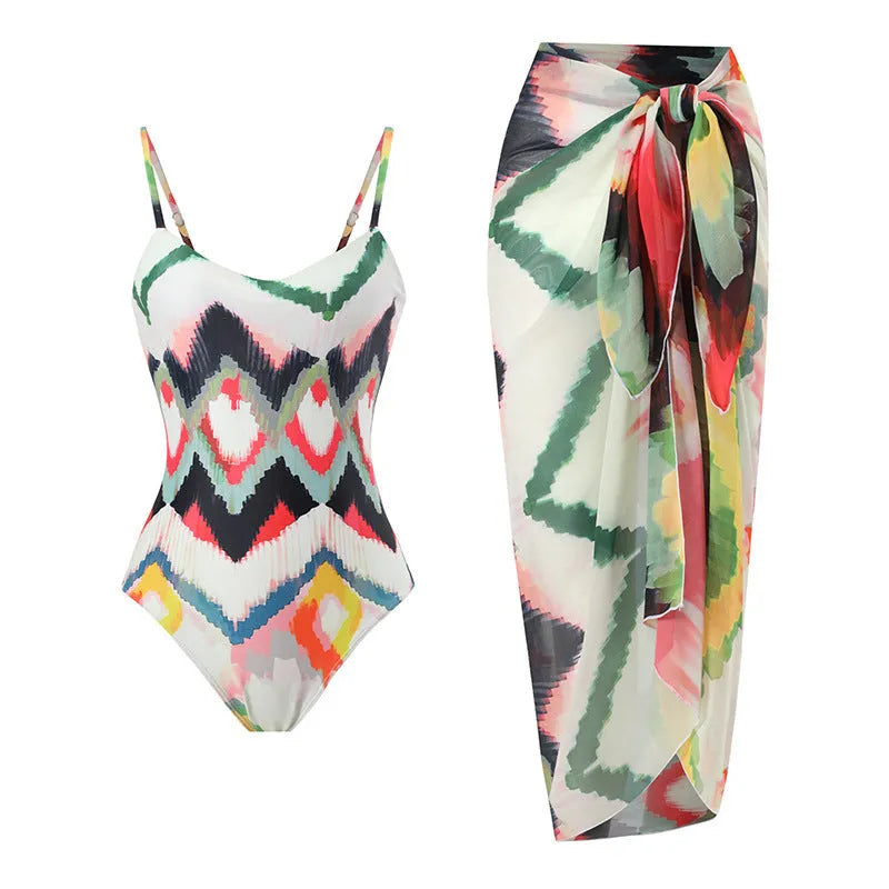 Women's two-piece polyester swimsuit with striped gradient print and matching hip skirt