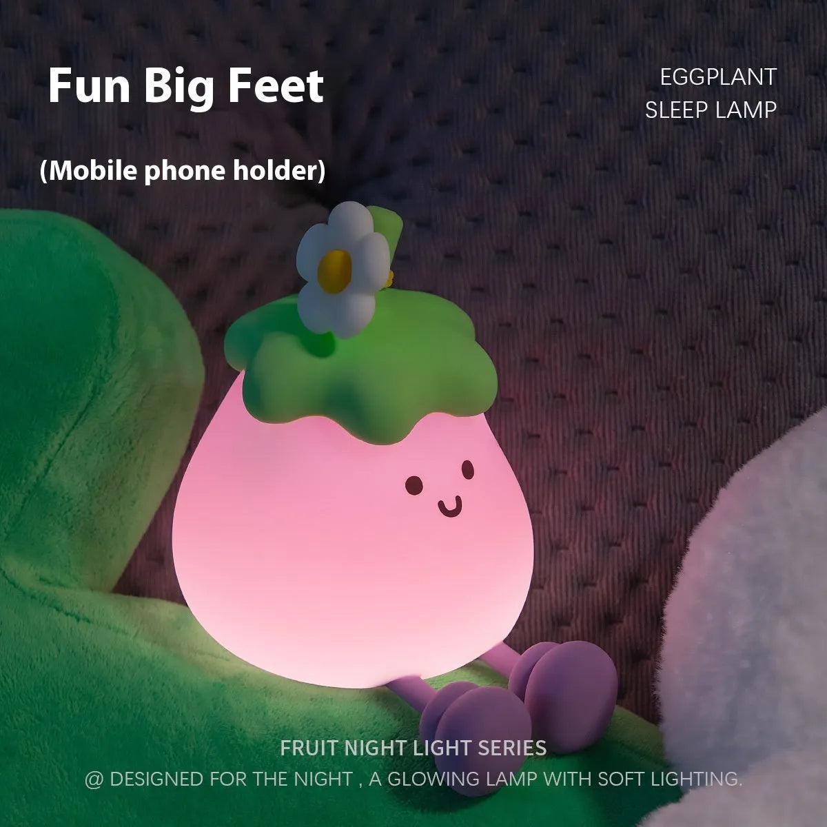 Cartoon eggplant-shaped small night lamp with soft yellow glow, shown next to a broccoli design variant.