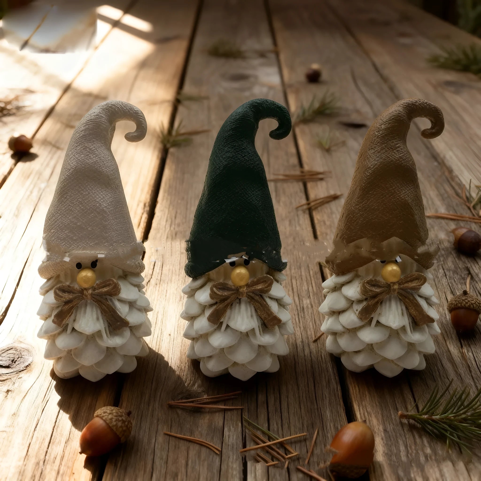 Three resin dwarf pine cone decorations in a set, each 9x5x4cm, for autumn harvest festival display