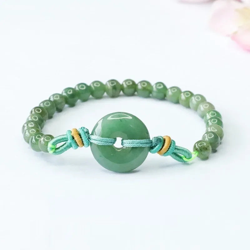 Natural emerald jade safety buckle bracelet with star-shaped buckle, 6mm green beads on adjustable cord