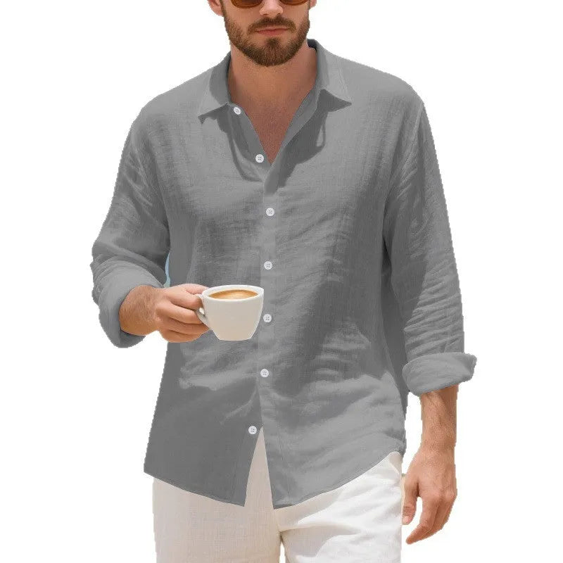 Man wearing a loose-fitting linen casual shirt in a light colour, showing the non-iron texture and American style.