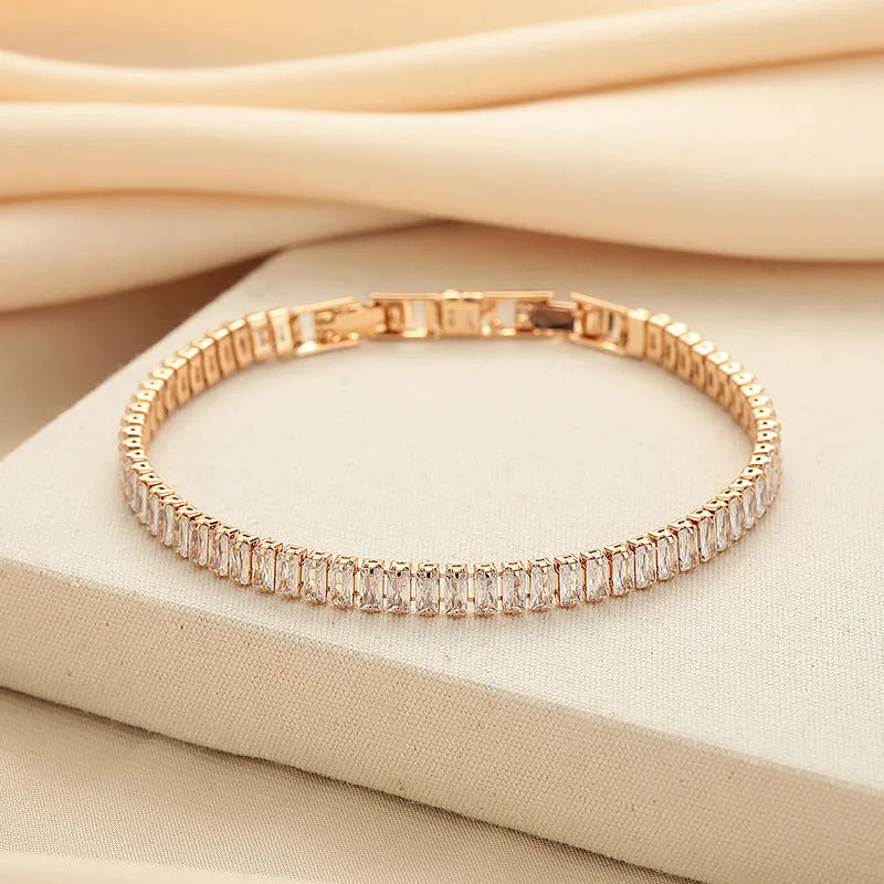 Geometric brass bracelet with quadrilateral full diamond zircon inlay in champagne gold colour