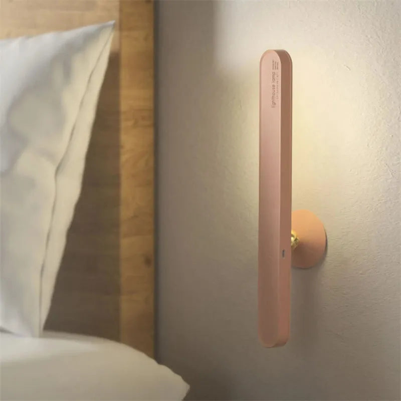 Geometric wireless table lamp with magnetic suction on metal surface showing USB connection