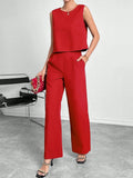 Red and navy blue women's sleeveless top and wide leg pants two-piece set on a hanger.