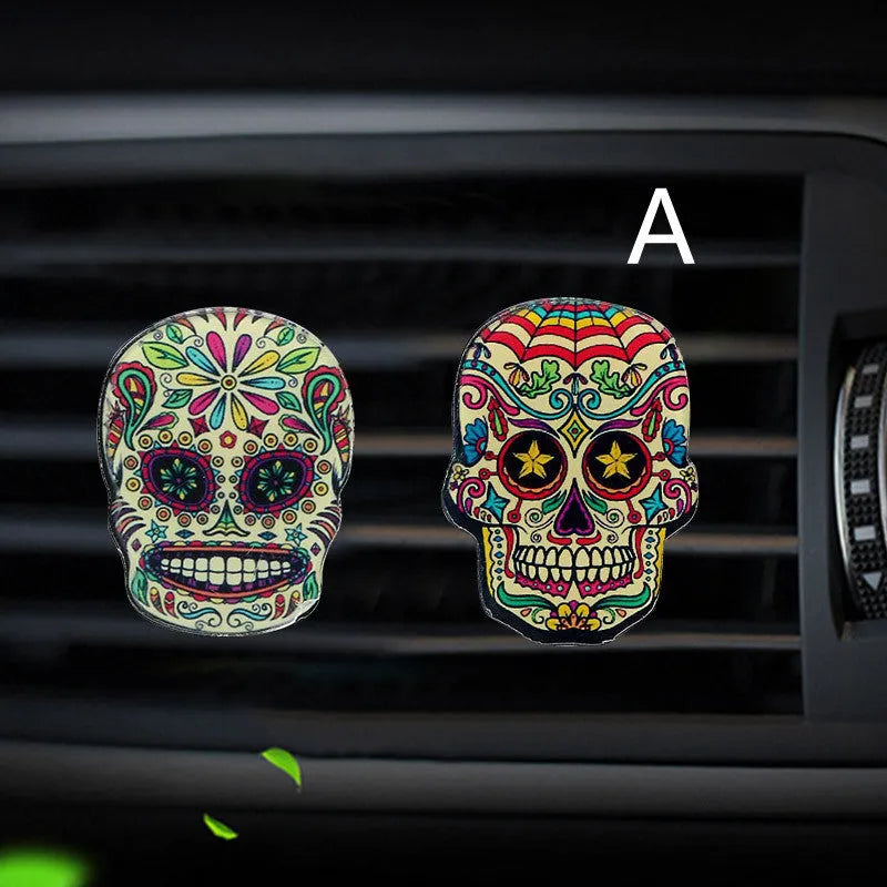 Skull-shaped acrylic car air freshener vent clip with mixed fragrance, 3.5-4.5 cm, colour option shown.