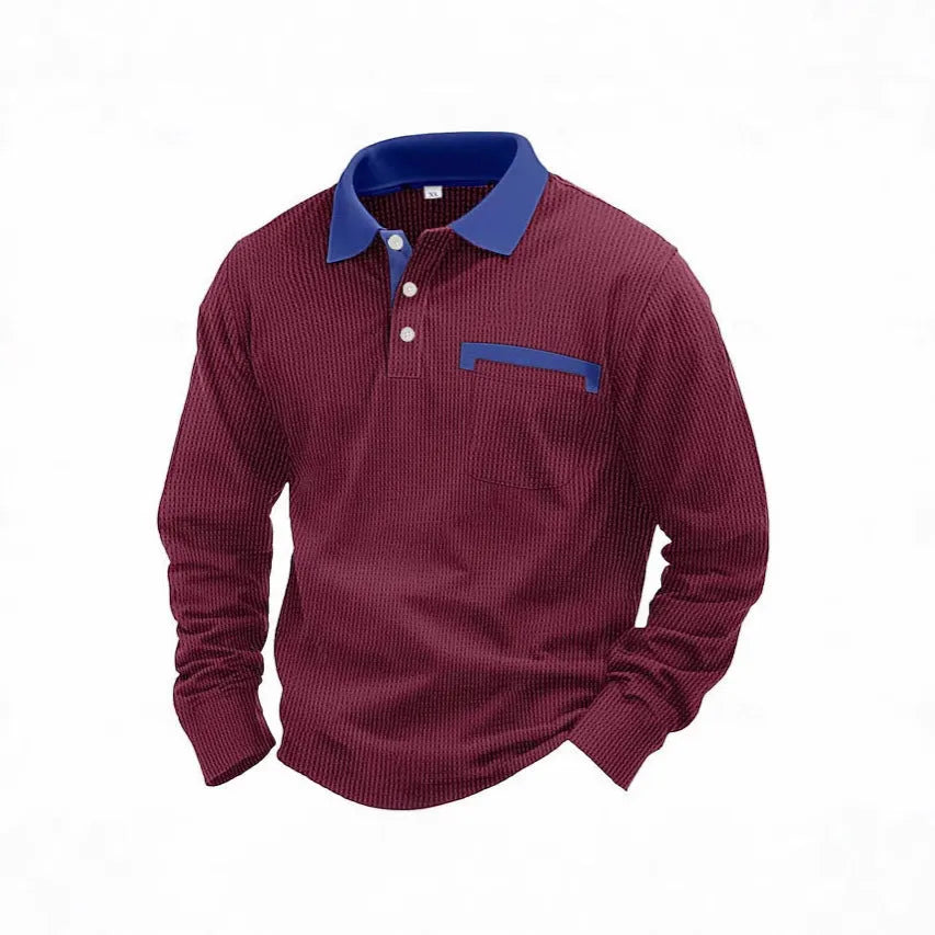 Man wearing a long-sleeved waffle-texture polo shirt in a solid colour with a loose, retro fit.