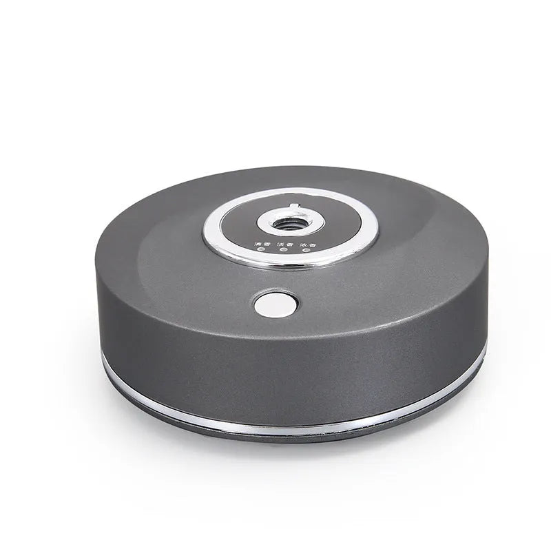 USB-powered intelligent car air freshener diffuser in black plastic housing with charging cable