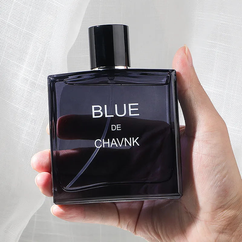 Men's perfume in black bottle with woody citrus fragrance notes of sandalwood and cedar