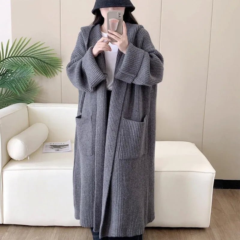 Loose hooded acrylic cardigan coat for women in beige colour with 80cm length and raglan sleeves