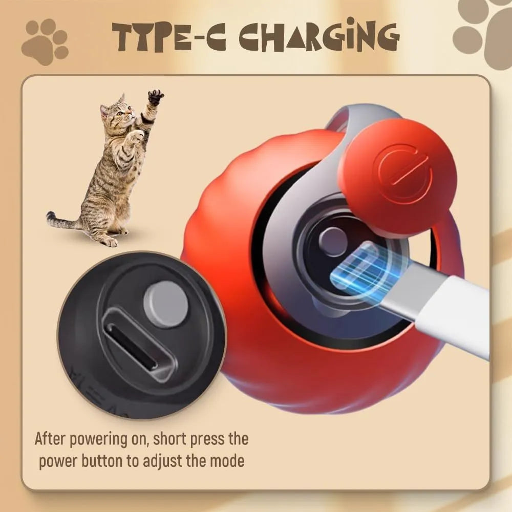 Self-moving cat toy ball in blue on a floor with a cat pawing at it