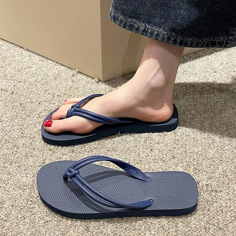 Men's casual PVC flip flops in a toe-covering style on a white background.