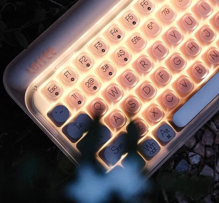 Liquid Foundation wireless mechanical keyboard kit with mouse, pickup light and calculator on desktop