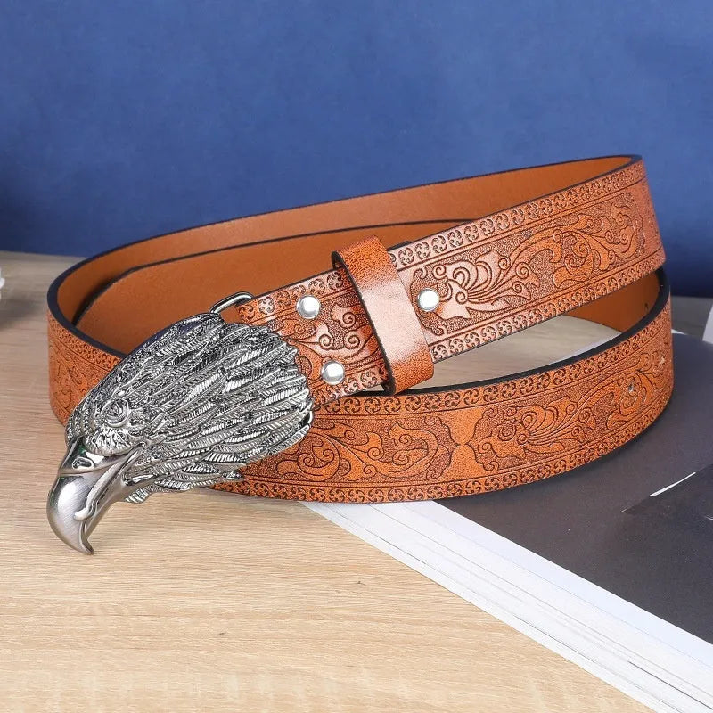 Men's brown imitation leather belt with a detailed metal cow head buckle and pin clasp.