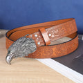 Men's brown imitation leather belt with a detailed metal cow head buckle and pin clasp.