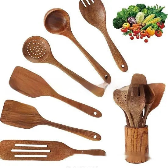 7-piece wooden kitchen utensil set showing four different spoon and spatula designs on a kitchen surface