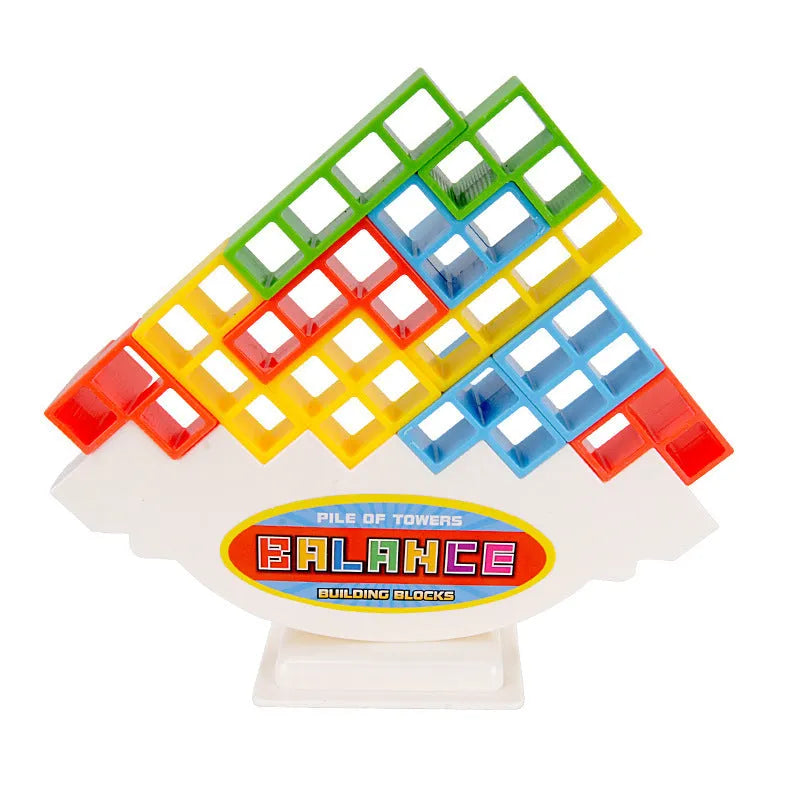 Plastic balance stacking board game with 16 coloured building blocks, chassis, and base on table.