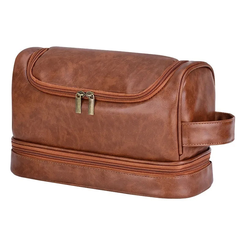 Leather travel toiletry bag in brown with hook, showing main compartment and portable design