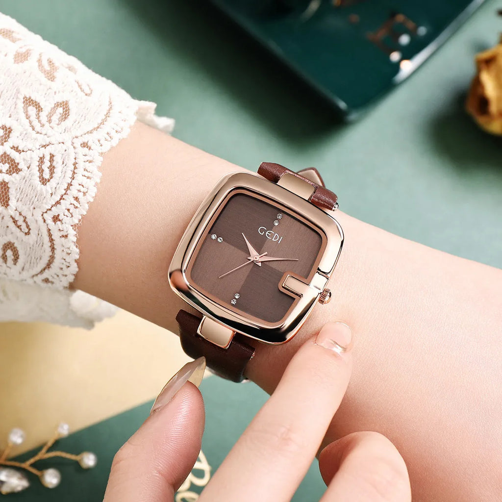 Women's quartz watch with leather strap in coffee colour showing 36mm dial and hardened glass
