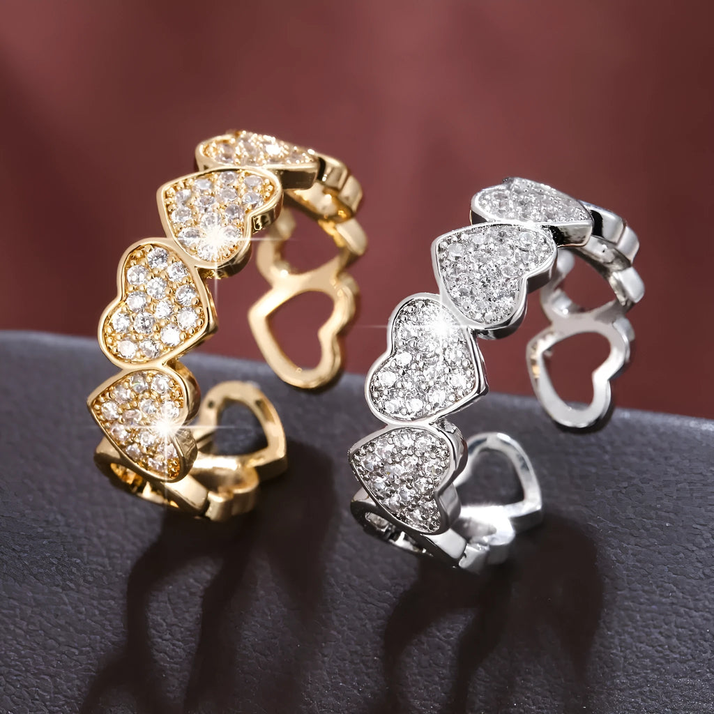 Adjustable geometric love heart couples ring in gold colour on small finger