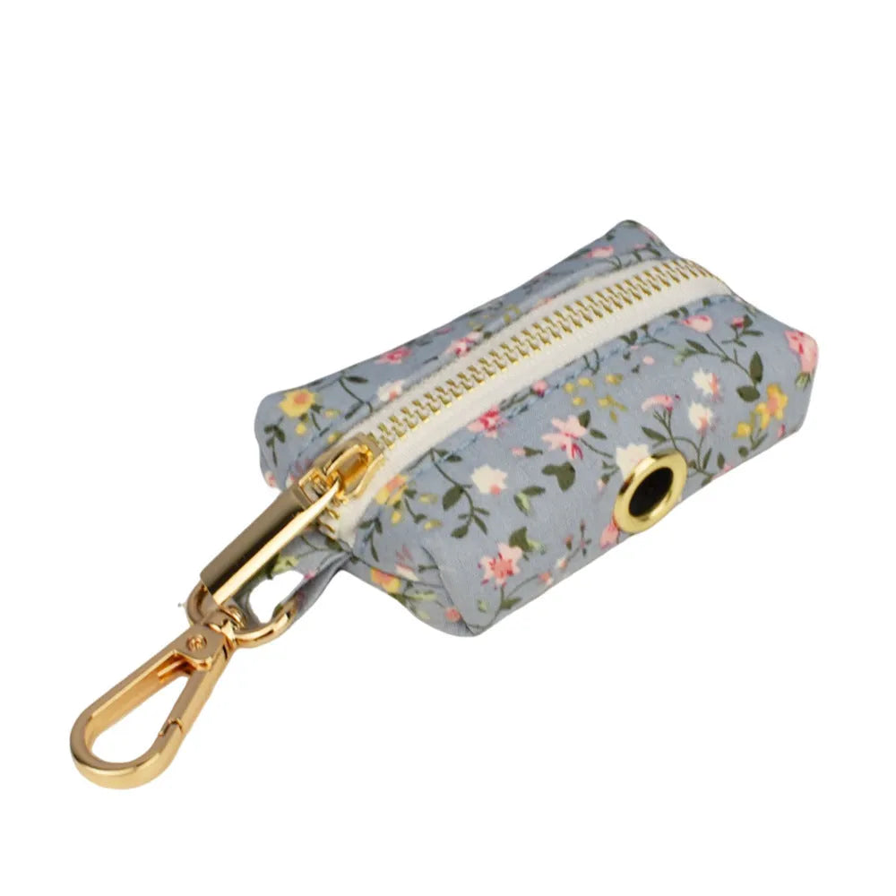 Blue floral polyester cotton dog collar set with matching leash, vest, bow and accessories
