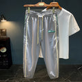 Men's black ice silk harem pants with mid waist and straight leg design