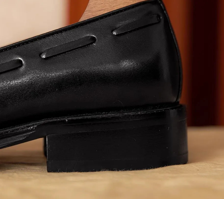 Men's black genuine leather loafers with fringed British styling and slip-on design