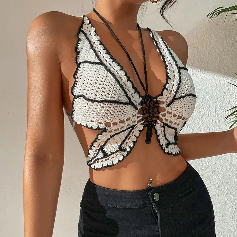 Women's black and white classic style bikini swimsuit made from acrylic fabric.