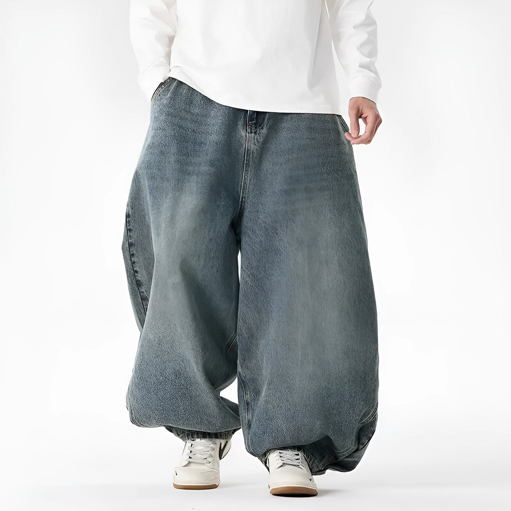Men's plus size wide leg casual jeans in dark blue denim with straight leg opening