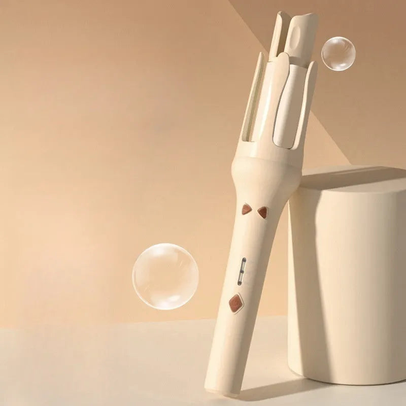 Automatic hair curler in a selected colour with 32mm barrel and power adapter.
